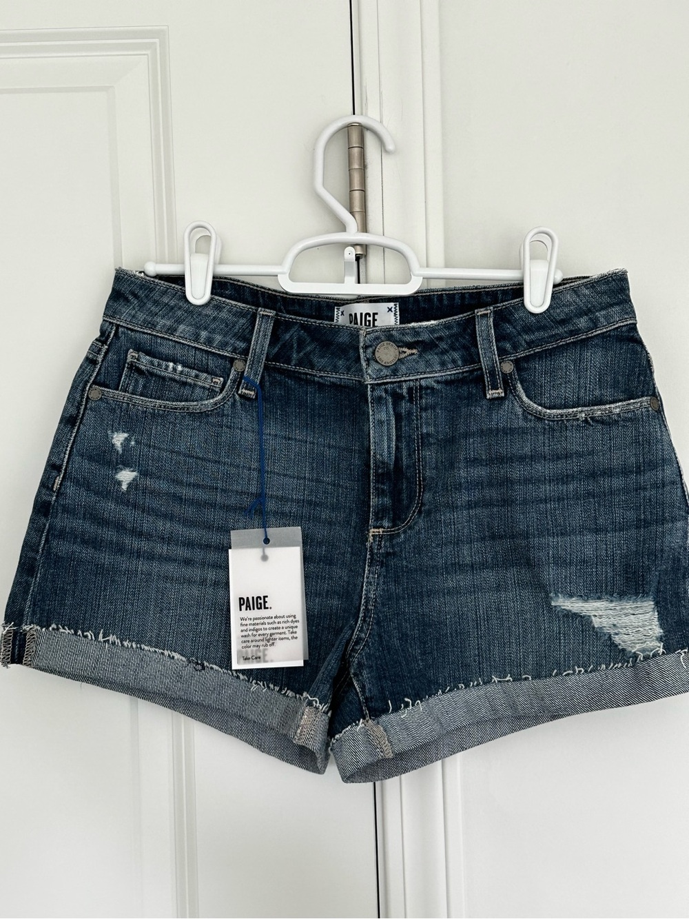 PAIGE Medium Dark Blue Distressed Denim Shorts
